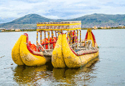 Traditional boats in the floating and tourist Islands of lake